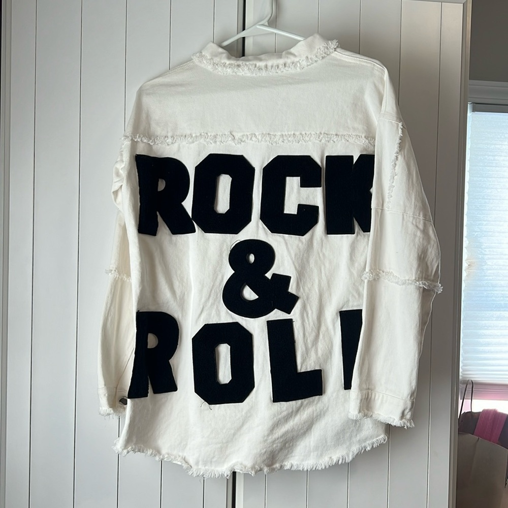 Rock and roll Buttoned down white shirt.